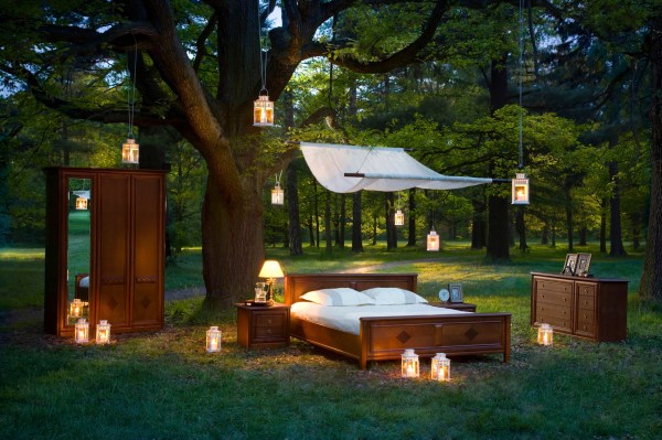 bed in forest - concept of good sleep